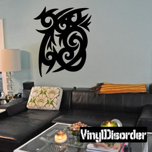 Black tribal vinyl wall decal with ornate circular pattern and swirls