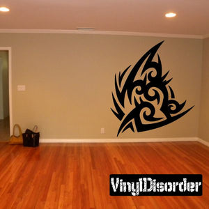 Tribal animal wall decal with bold black swirling design