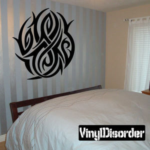Black tribal vinyl wall decal with ornate swirling pattern