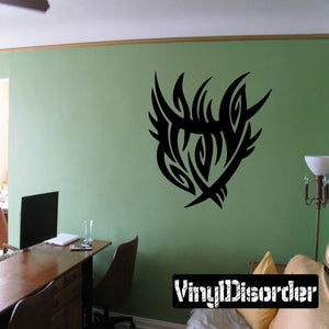 Black tribal wing vinyl wall decal with flame-like shapes