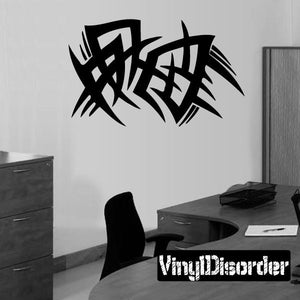 Black tribal vinyl wall decal with bold abstract knot design