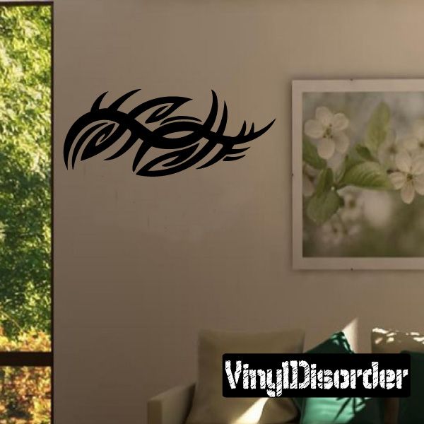Black tribal vinyl wall decal with swirling tribal design