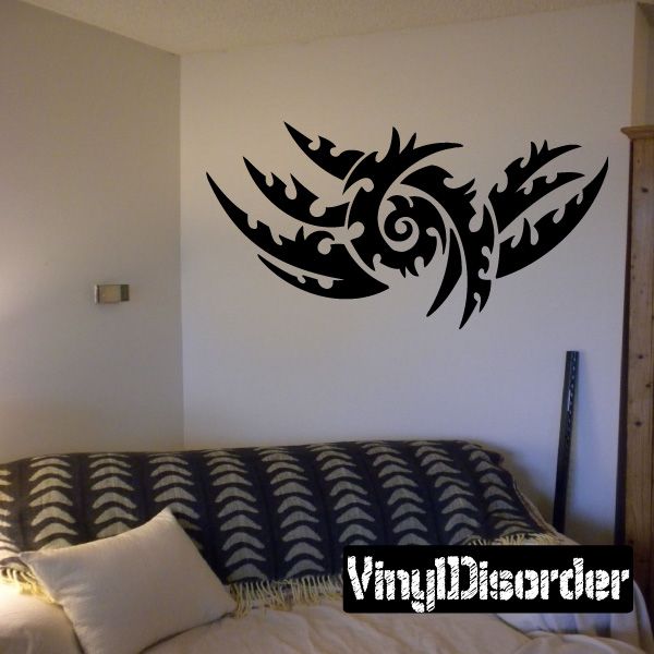 Tribal vinyl wall decal, black ornate winged swirl design with curling patterns