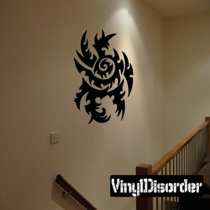 Black tribal wall decal with stylized dragon crest