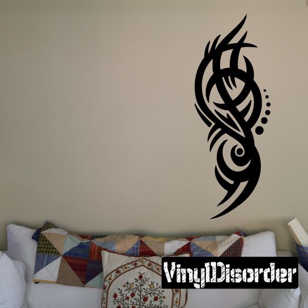 Black tribal bird wall decal with swirling feather pattern