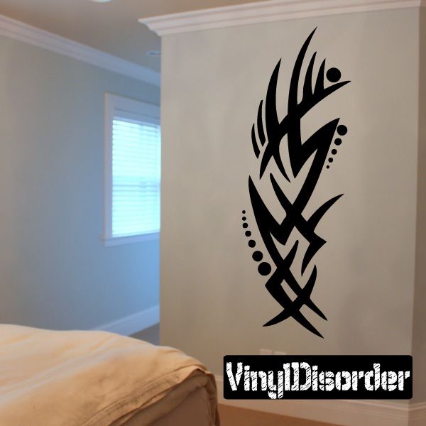 Tribal vinyl wall decal with black bird-like swirl design