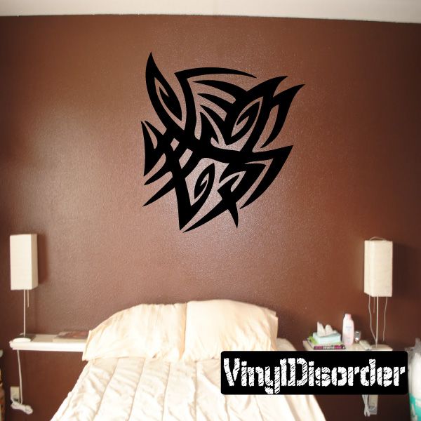 Black tribal vinyl wall decal with angular geometric emblem