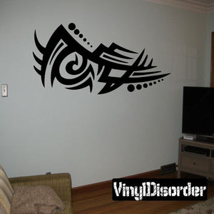 Tribal vinyl wall decal in black with curved swirl and dot accents