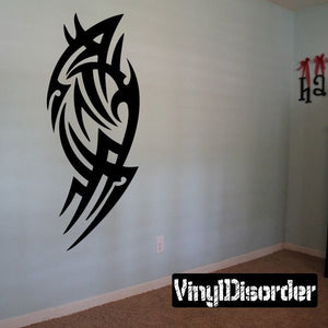 Black tribal wall decal featuring a stylized horned dragon head