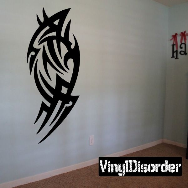 Black tribal wall decal featuring a stylized horned dragon head