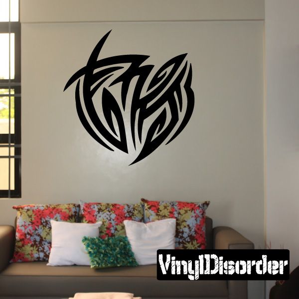 Tribal wall decal vinyl with black stylized winged emblem shape
