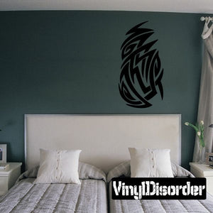 Tribal vinyl wall decal with black stylized crest swirl pattern