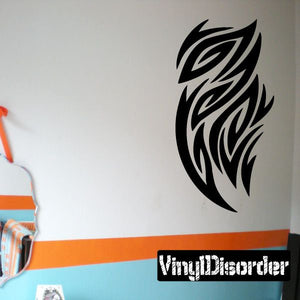 Black tribal swirl vinyl wall decal with feather-like shapes