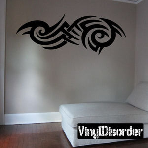 Black tribal swirl wall decal with spiral and feather-like accents