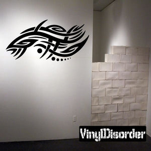 Tribal vinyl wall decal with black geometric bird-like design