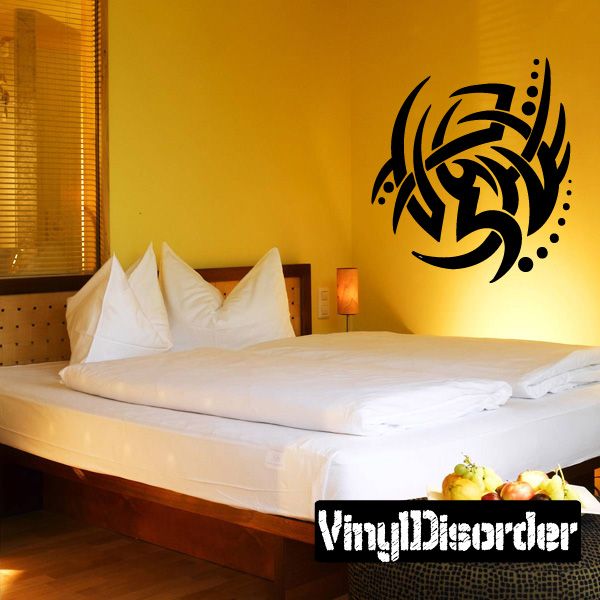 Black tribal wall decal sticker with swirling emblem design