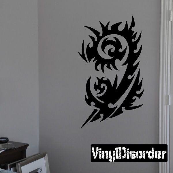 Black tribal bird flame wall decal with swirling flame shapes