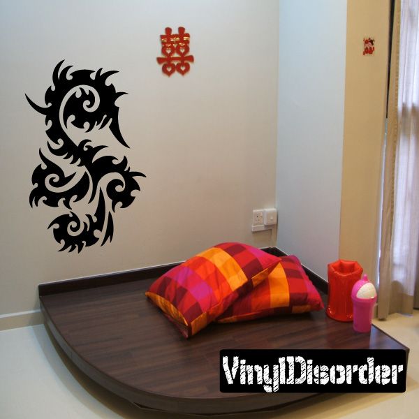 Tribal vinyl wall decal, black stylized dragon face and swirling ornaments