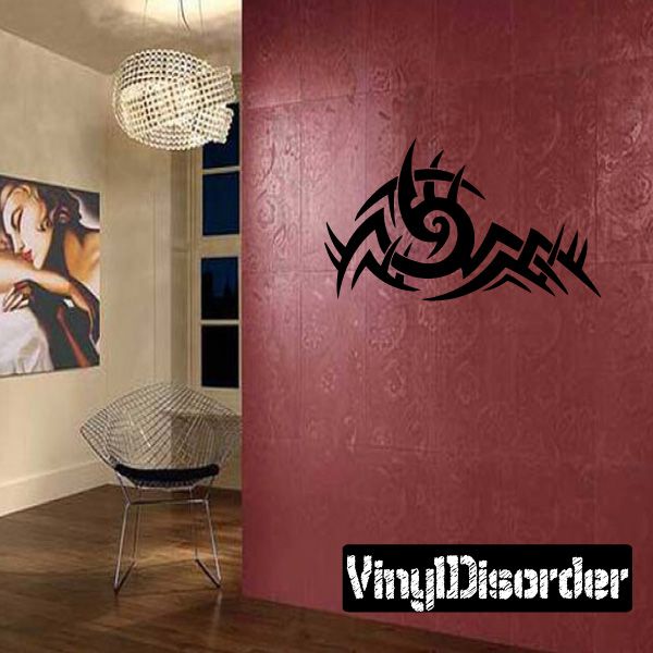 Tribal vinyl wall decal with black geometric animal-like emblem