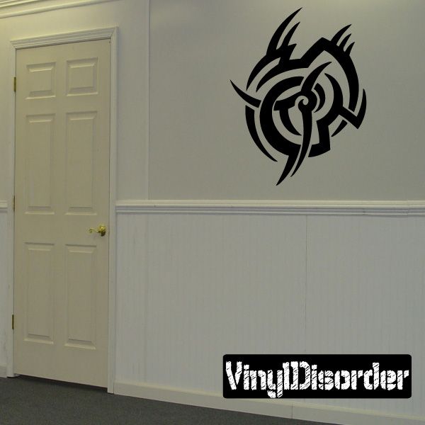 Tribal vinyl wall decal with black bird-like spiral emblem