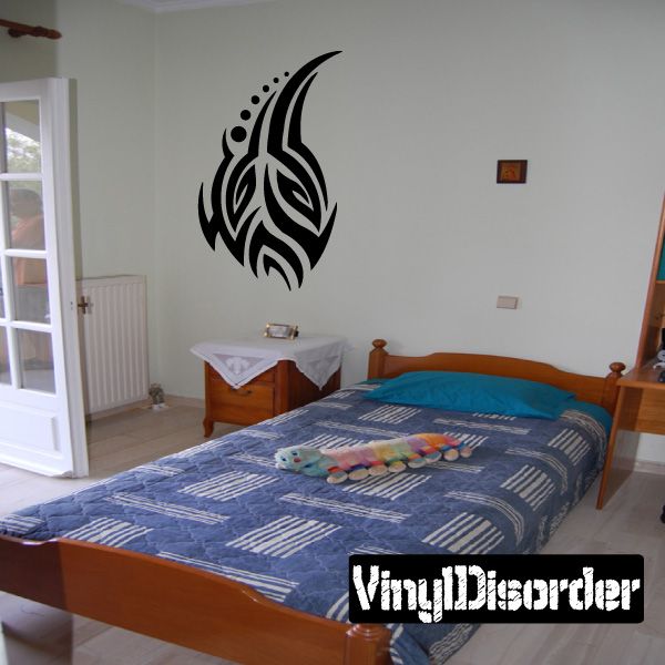Black tribal wall decal with birdlike flame swirl design