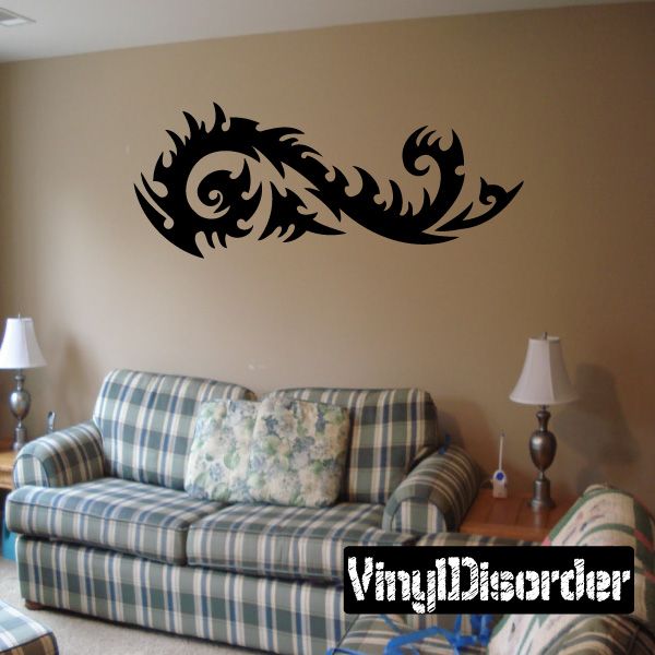 Tribal vinyl wall decal with black swirling dragon design