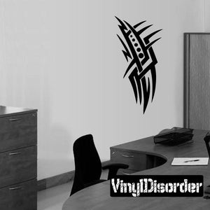 Black tribal geometric wall decal with pointed spikes and circular dot accents