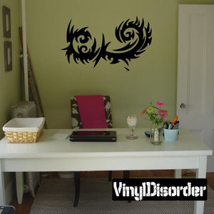 Tribal vinyl wall decal with dark dragon-like swirl design