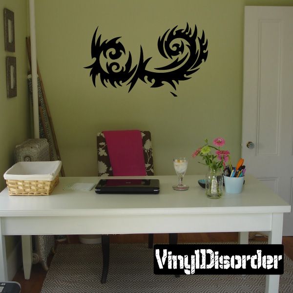 Tribal vinyl wall decal with dark dragon-like swirl design