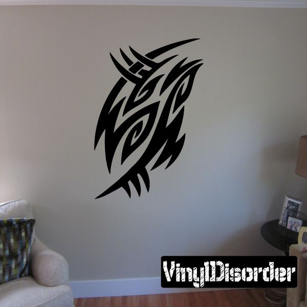 Black tribal vinyl wall decal with stylized winged graphic