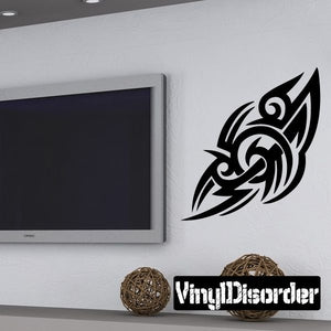 Tribal vinyl wall decal with black swirl and dagger arrow design