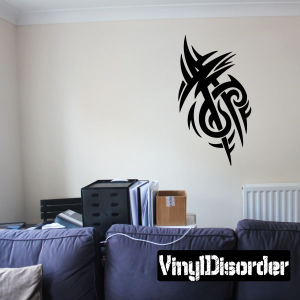 Black tribal vinyl wall decal with stylized dragon head design