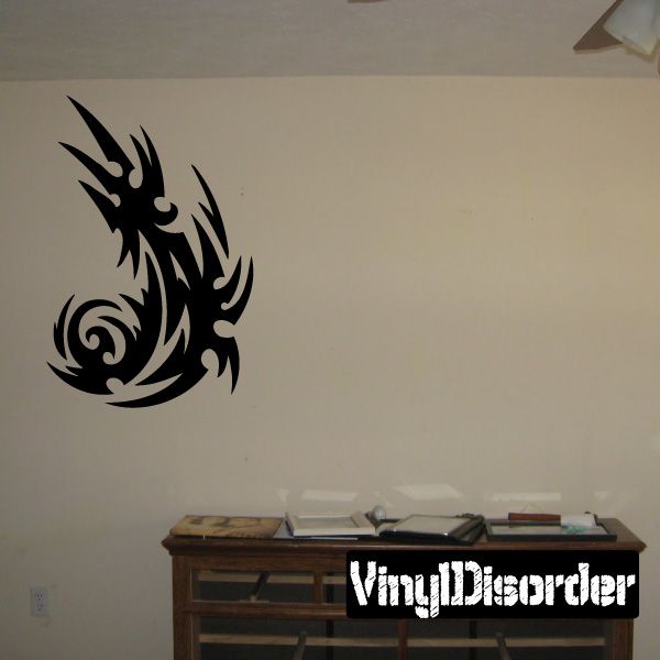 Tribal wall decal featuring a black dragon silhouette with ornate swirl details