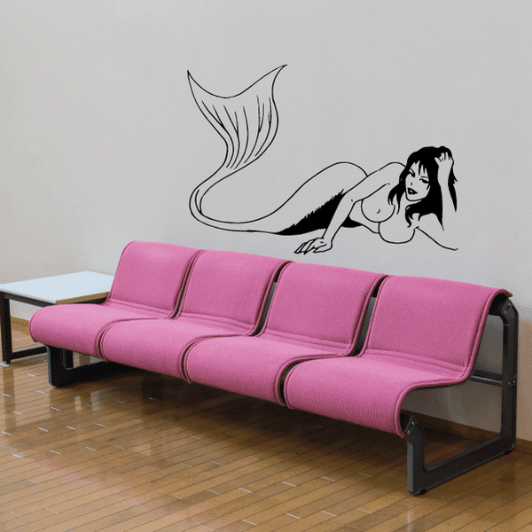 Mermaid sunbathing wall decal with outlined mermaid and curled tail