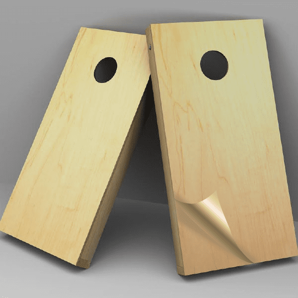 Cornhole boards with circular holes, natural wood finish