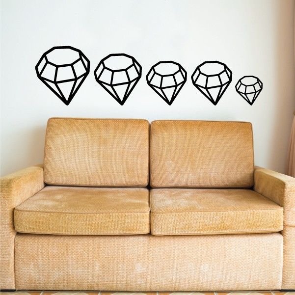 Diamond decal set with five clear geometric gem outlines on a sofa back