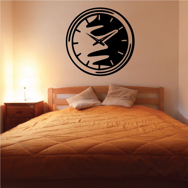 Round black analog clock wall decal with Roman numeral style marks and sweeping hands