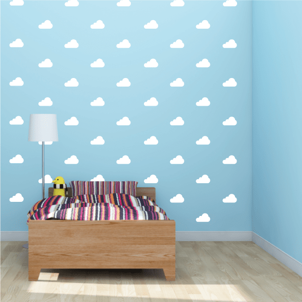 Cloud pattern vinyl wall decal sheet with small white cloud shapes on light blue wall