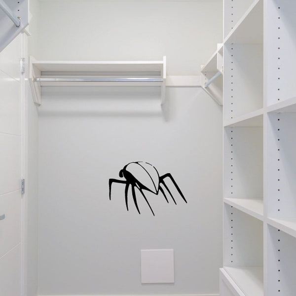 Running cockroach wall decal, black silhouette on white surface
