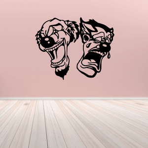 Wall decal of two clown faces, black line art with smiling and crying masks