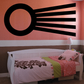 Black astrological decal with circular emblem and horizontal ray lines