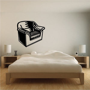 Armchair wall decal with thumbs-up icon, black outline