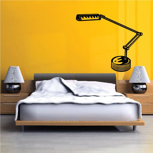 Black desk lamp decal with adjustable arm and shade on wall