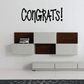 Congrats wall quote decal with bold black “CONGRATS!” lettering on wall