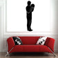 Bowling player wall decal with black silhouette of two figures holding ball