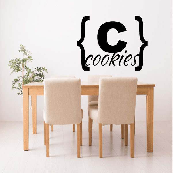 Black wall decal reading “cookies” with curly bracket style lettering