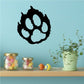 Cougar paw decal in black, bold silhouette paw print