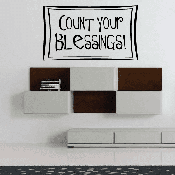 Inspirational wall decal with 'Count your blessings!' in black and white border