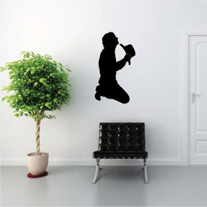 Praying cowboy holding a hat wall decal silhouette