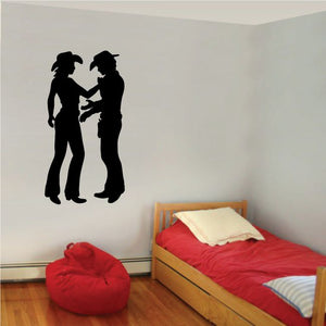 Black cowboy love wall decal of two standing cowboys holding hands